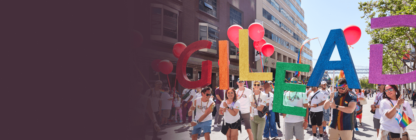 A group of people walking in street 