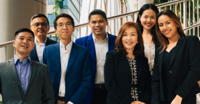 Group of men and women in business attire