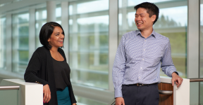 Woman and man in office building